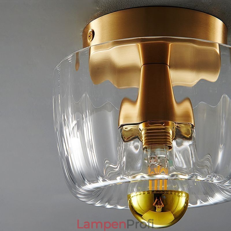 Moderne Wandbeleuchtung mit klarem Glasschirm, gebürstete Wandleuchte